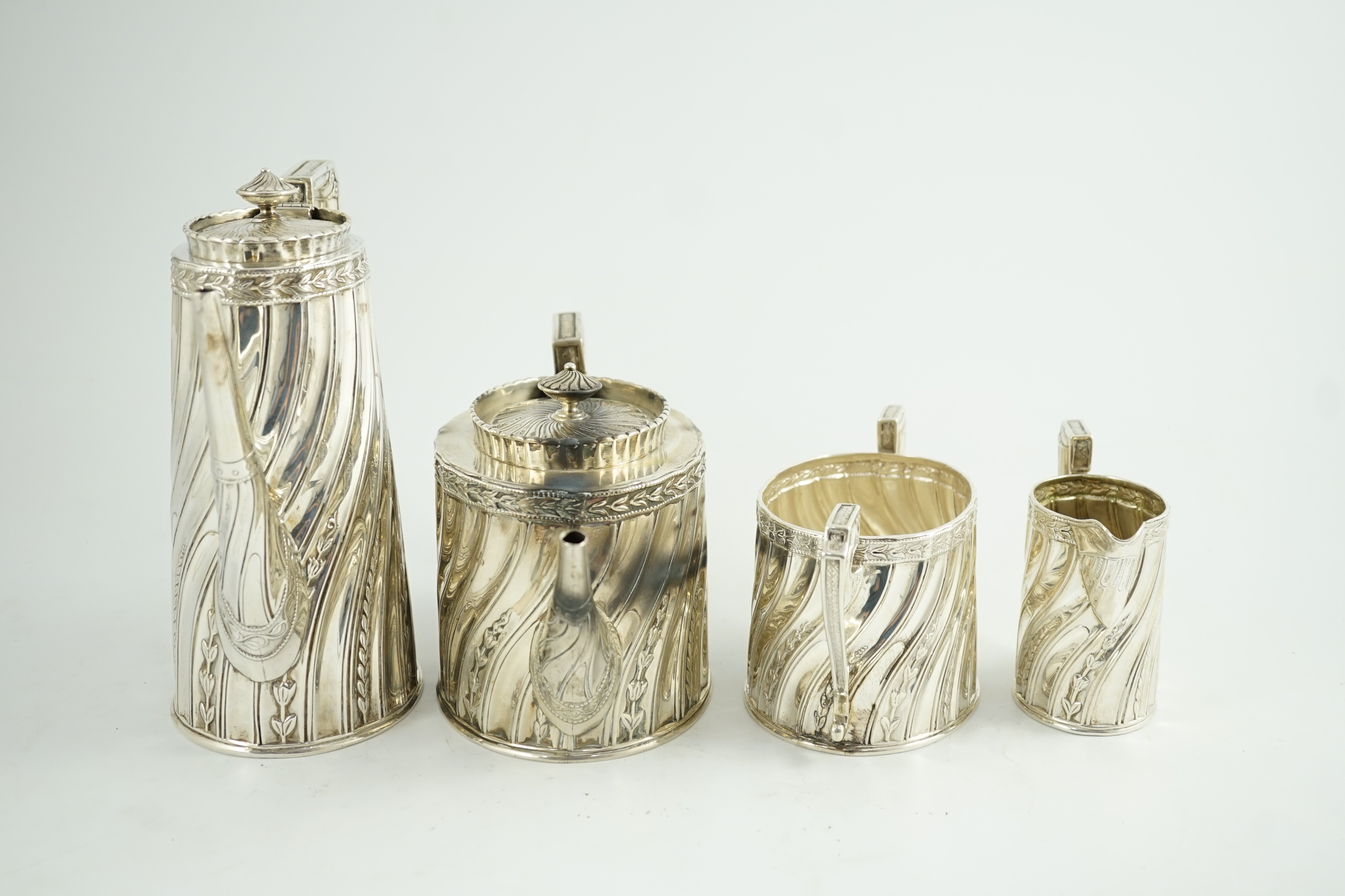 A late Victorian silver four tea and coffee service, by Walter & John Barnard